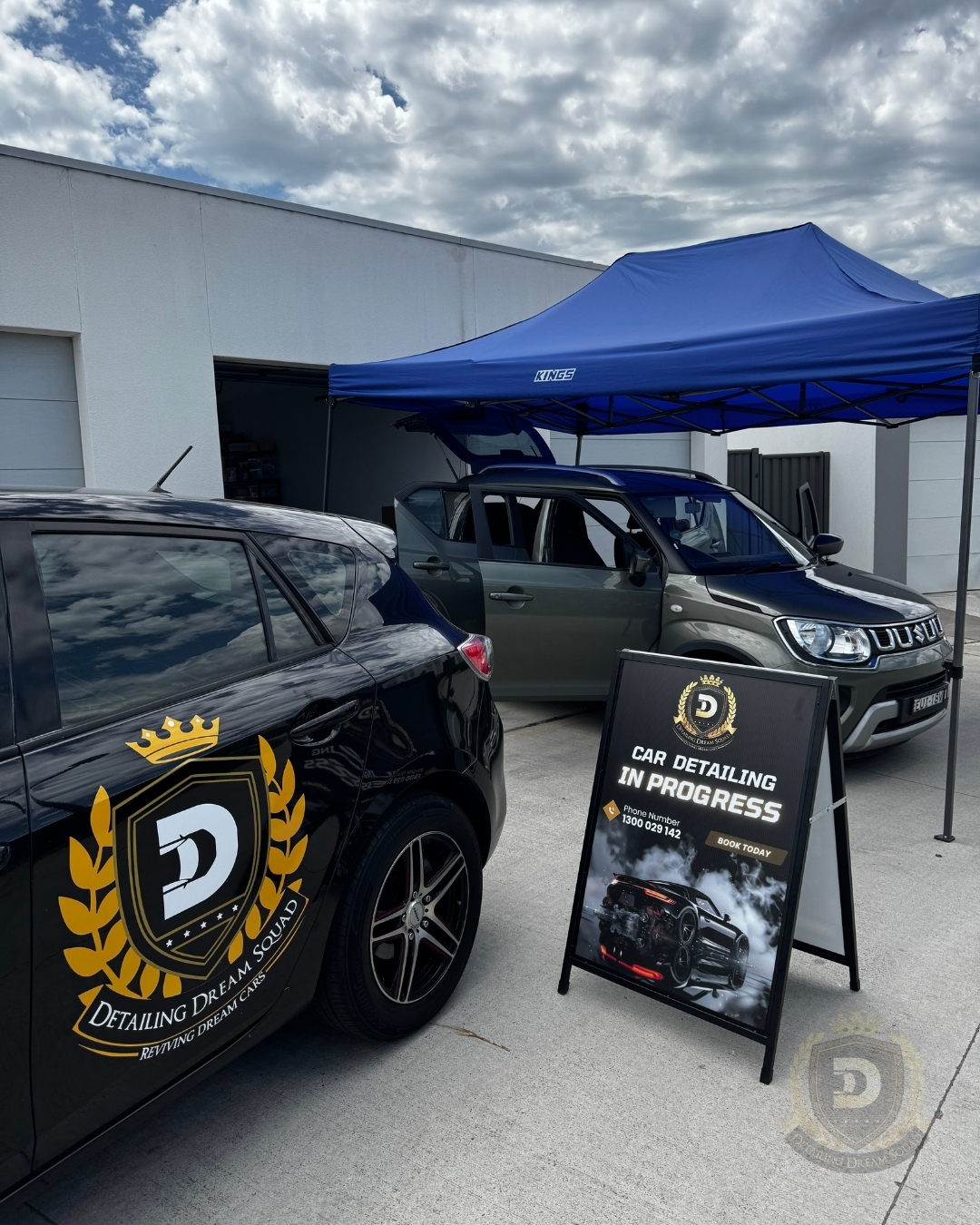 Detailing Dream Squad mobile service van and 'Car Detailing In Progress' sign at a customer location in Sydney.