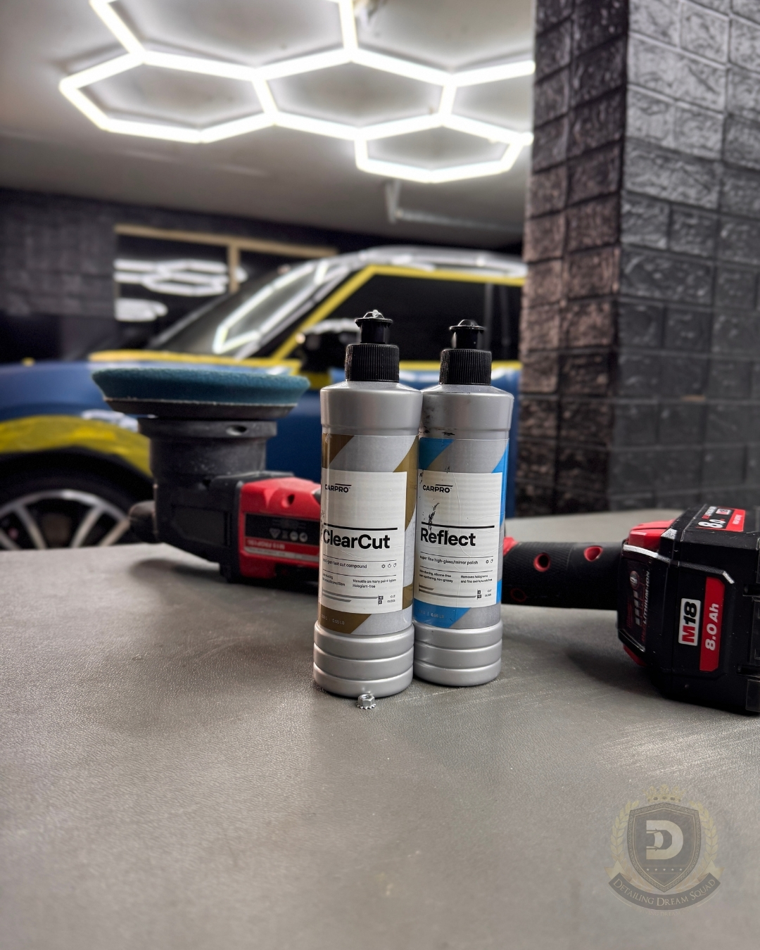 CarPro ClearCut and Reflect polishing compounds with dual action polisher in Detailing Dream Squad studio used for professional paint correction in Sydney