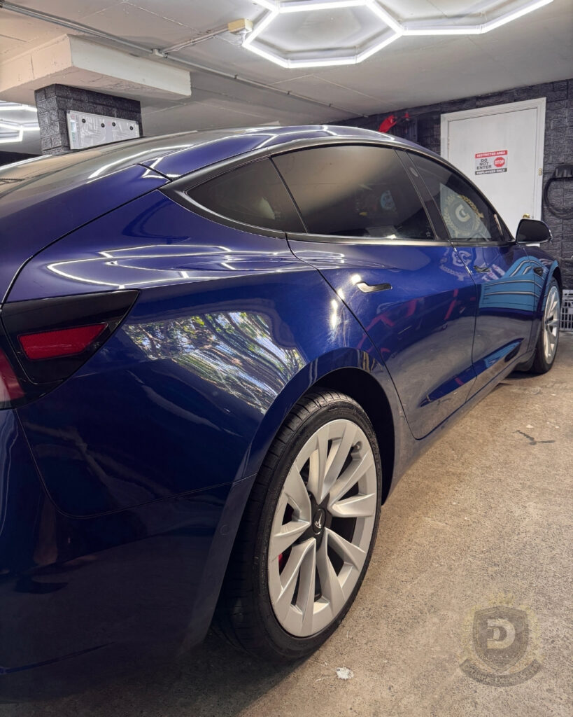 Ceramic coated Tesla EV with glossy paint and water‑repellent finish in Sydney
