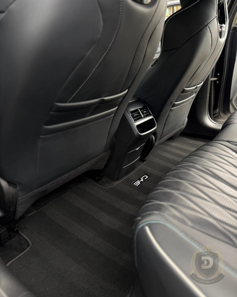 Freshly detailed car interior with clean carpets and leather seats after interior protection service by Detailing Dream Squad in Sydney